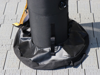 Gewichtszak in gebruik rond de poot