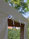 Vouwtent 3 x 3 m S50 beige opgerolde deur