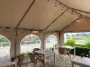 Feesttent buisklem waaraan heater is bevestigd